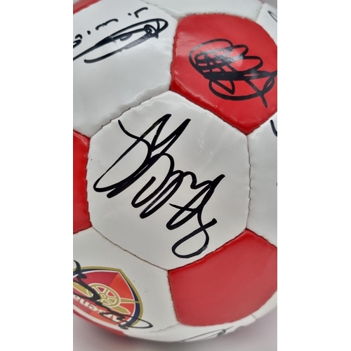 23 - An Authentic Arsenal FC 2003 F.A. Cup Winning Squad Signed Football. Over 20 signatures: Including: ... 