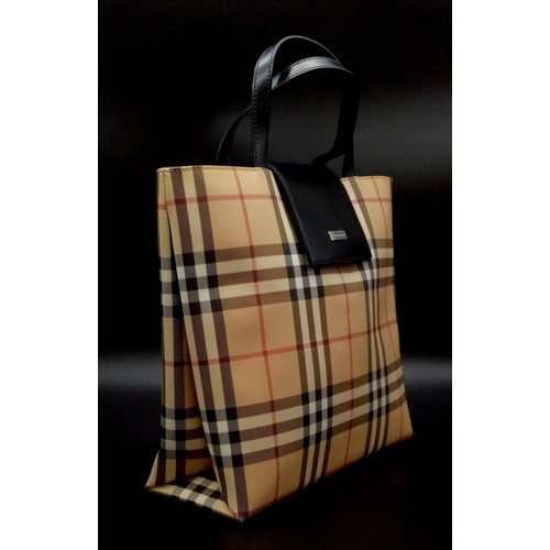 400 - A BURBERRY handbag with original protective cloth bag. Appr. dimensions: 27 x 11 x 27 cm. Ref: 9396