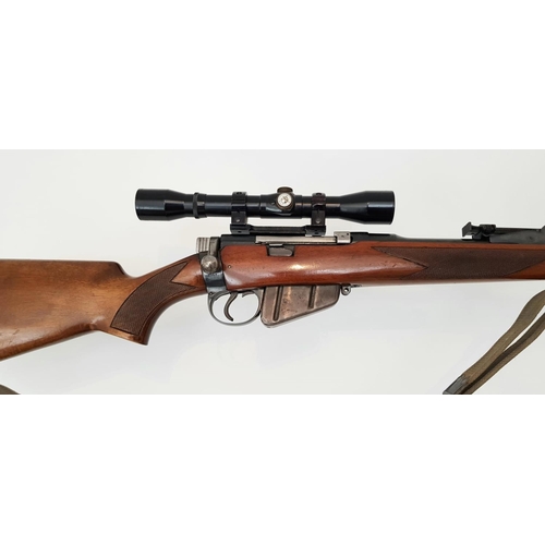 90 - A Parker Hale Enfield .303 Bolt Action Sporting Rifle. Fitted parker Hale scope mount and rings.
Nik... 