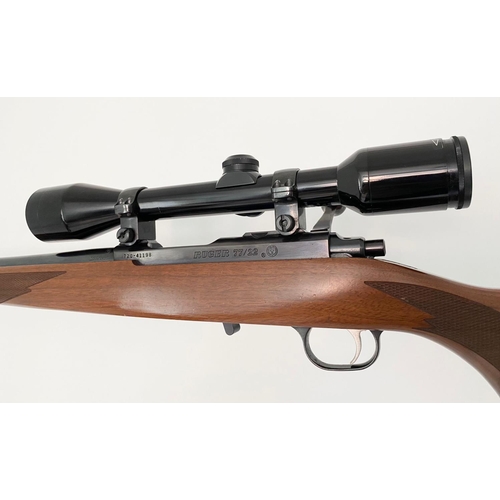 61 - A Ruger M77/22 Bolt Action .22 Rifle. Very good, near mint condition overall. Fitted Bushnell scope ... 