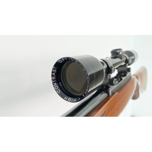 61 - A Ruger M77/22 Bolt Action .22 Rifle. Very good, near mint condition overall. Fitted Bushnell scope ... 