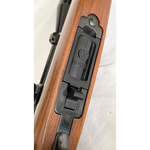 61 - A Ruger M77/22 Bolt Action .22 Rifle. Very good, near mint condition overall. Fitted Bushnell scope ... 