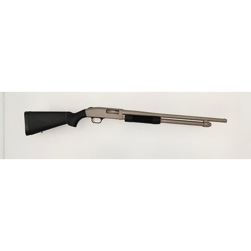 82 - A Mossberg 12 Gauge Pump-Action Shotgun. Stainless steel marine model. 7 plus 1 magazine.