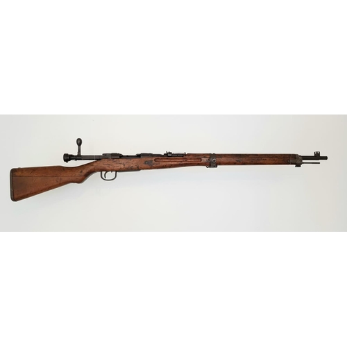 33 - A Japanese Arisaka Model 99 Bolt Action Service Rifle. 7.7 x 58R calibre. Re-proofed 2022.