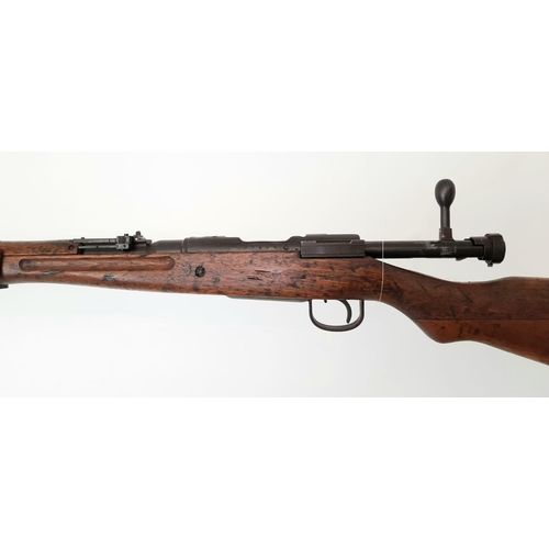 33 - A Japanese Arisaka Model 99 Bolt Action Service Rifle. 7.7 x 58R calibre. Re-proofed 2022.