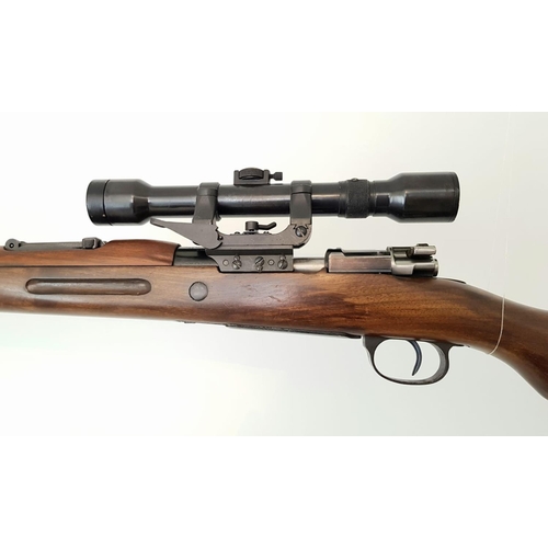 50 - A 1953 La Coruna Model M43 Bolt Action Rifle. Spanish made - calibre 7.92mm. Fitted side rail mount ... 