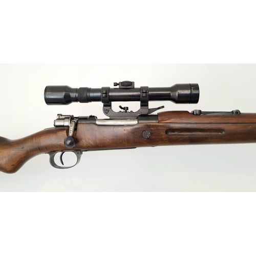 50 - A 1953 La Coruna Model M43 Bolt Action Rifle. Spanish made - calibre 7.92mm. Fitted side rail mount ... 