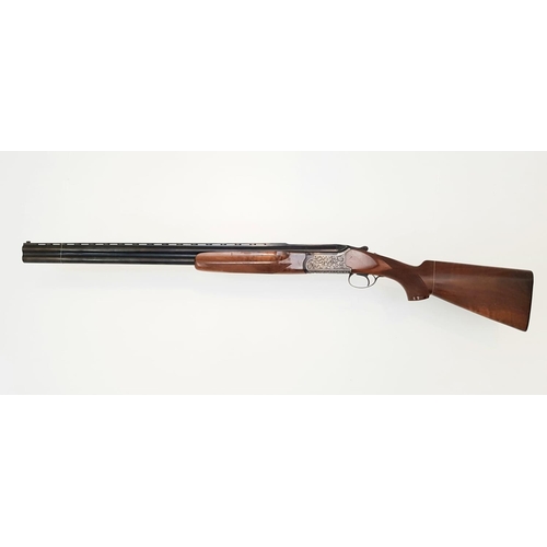 87 - A Fabarm 12 Gauge Over and Under Shotgun. Single trigger ejector. 28 inch barrels. Good overall cond... 