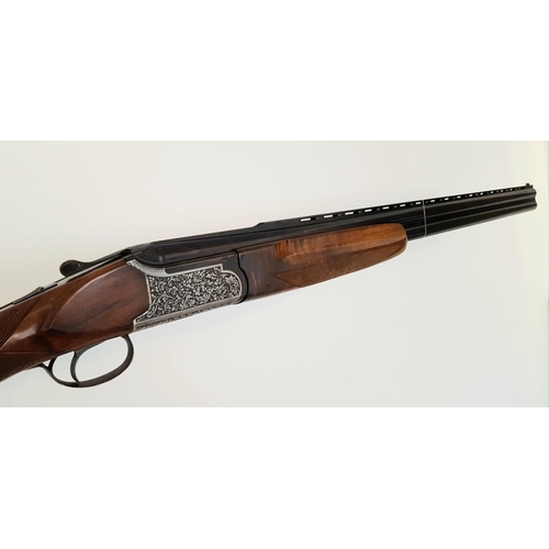 87 - A Fabarm 12 Gauge Over and Under Shotgun. Single trigger ejector. 28 inch barrels. Good overall cond... 