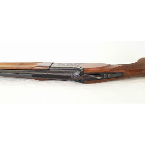 87 - A Fabarm 12 Gauge Over and Under Shotgun. Single trigger ejector. 28 inch barrels. Good overall cond... 