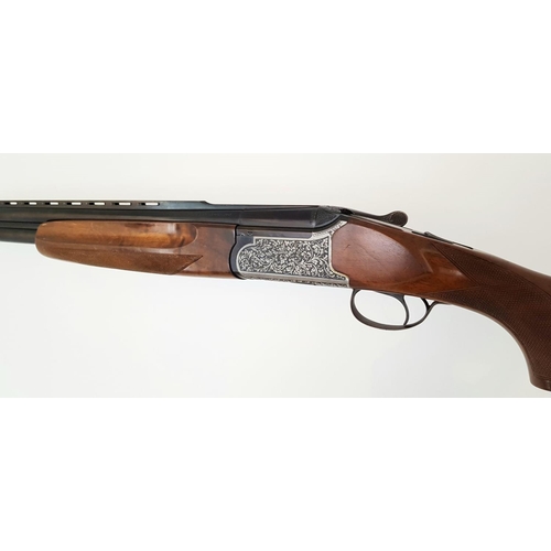 87 - A Fabarm 12 Gauge Over and Under Shotgun. Single trigger ejector. 28 inch barrels. Good overall cond... 