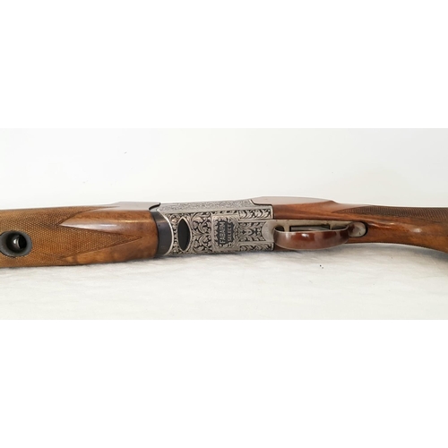 87 - A Fabarm 12 Gauge Over and Under Shotgun. Single trigger ejector. 28 inch barrels. Good overall cond... 