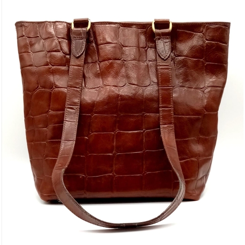 228 - A brown MULBERRY handbag. Appr. dimensions: 27 x 14 x 28 cm. ref: 9331