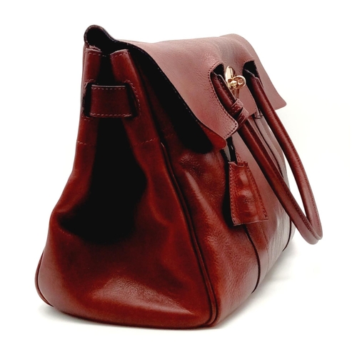 242 - A MULBERRY BAYSWATER bag in oxblood red colour. appr. dimensions: 37 x 16 x 27 cm. ref: 9346