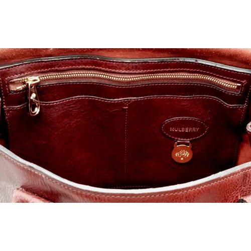 242 - A MULBERRY BAYSWATER bag in oxblood red colour. appr. dimensions: 37 x 16 x 27 cm. ref: 9346