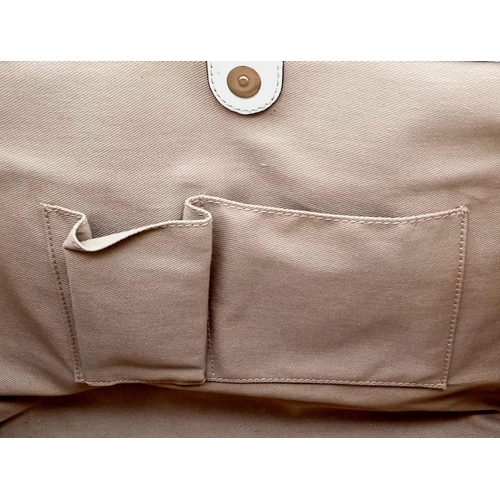 326 - A CELINE handbag with original cloth protective bag. Appr. dimensions: 35 x 16 x 27 cm. ref: 9389