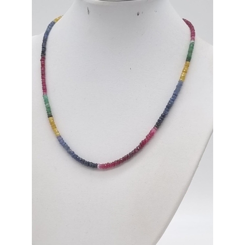 44 - A Natural Emerald, Sapphire and Ruby Bead Necklace. 40cm