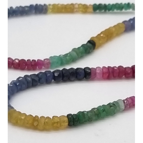 44 - A Natural Emerald, Sapphire and Ruby Bead Necklace. 40cm