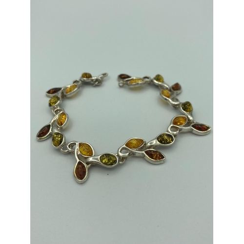 63 - Stunning AMBER set SILVER BRACELET ,Consisting  BALTIC AMBER Stones in three different colours set i... 