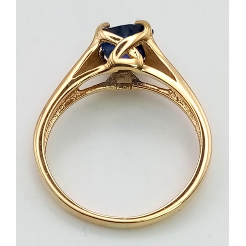 272 - An 18K Yellow Gold Sapphire Solitaire Ring. Rough, natural central sapphire. Size M 1/2. 3.67g total... 