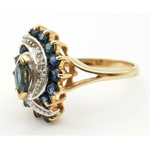 296 - 9K YELLOW GOLD FANCY TWIST DIMAOND & SAPPHIRE CLUSTER RING 2.7G SIZE L 1/2