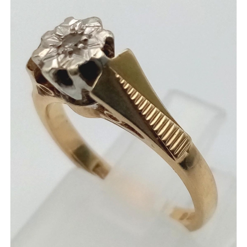 654 - A 9K Yellow Gold Diamond Solitaire Ring. Size J. 3g total weight.