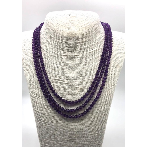 130 - A Beautiful Natural Amethyst Three-Strand Bead Necklace. 5mm beads. 42-46cm. Click and close clasp w... 