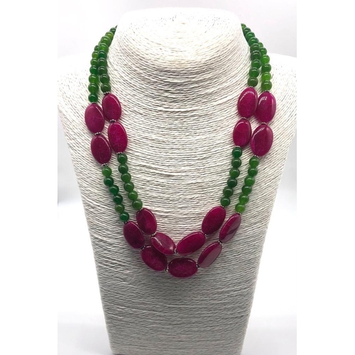 137 - A Jade and Ruby Two-Row Beaded Necklace. 8 and 20mm beads. 42-46cm.