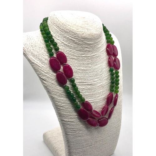 137 - A Jade and Ruby Two-Row Beaded Necklace. 8 and 20mm beads. 42-46cm.