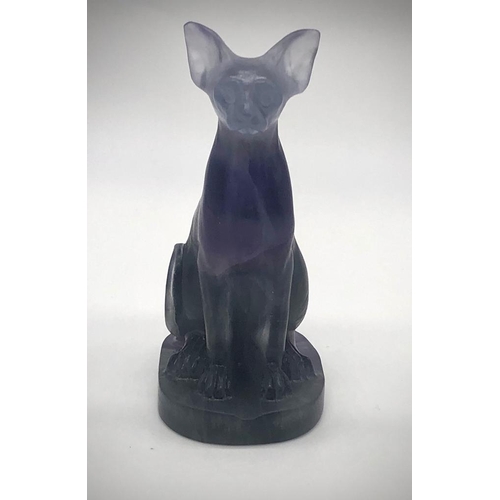 144 - A Rainbow Fluorite Hand-Carved Crystal Cat Figurine.
8 x 5cm.