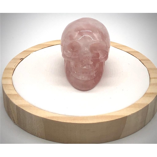 286 - A Rose Quartz Hand-Carved Crystal Skull. 5 x 4cm