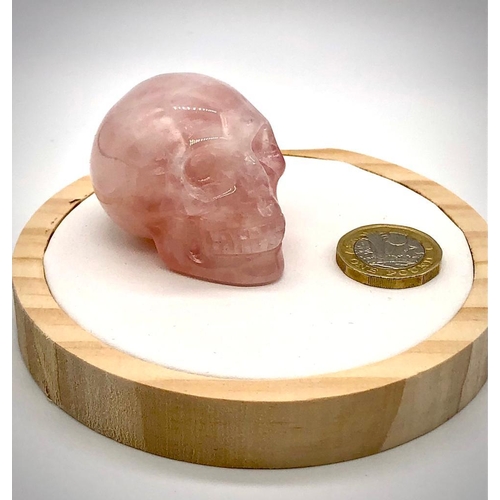 286 - A Rose Quartz Hand-Carved Crystal Skull. 5 x 4cm