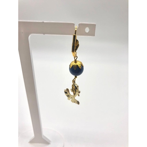 548 - A Pair of 24K Gold Plated Lapis Lazuli Ball Earrings with Leaping Fish Decoration. Lever back clasp.