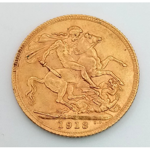 601 - A 22K Gold 1913 Full Sovereign Coin. 8g