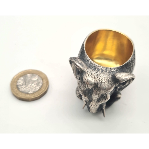 1195 - Russian gild solid silver elephant salt. Hallmarked to the base. 5cm x 3cm. Weight: 128 grams.