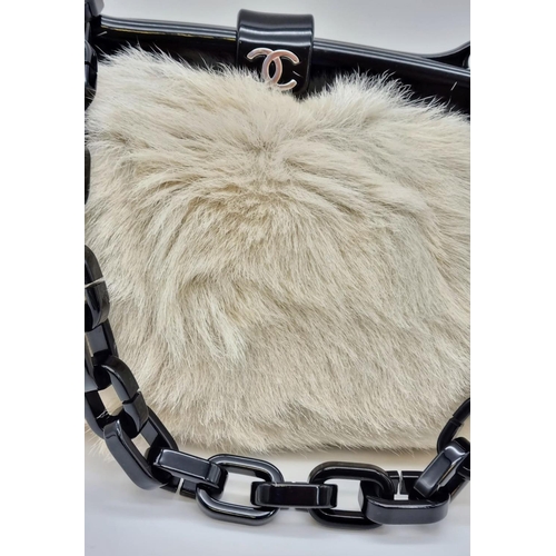 190 - A CHANEL 5 faux fur clutch bag with original cloth protective bag. Serial No: 10258973, Ref: 9378