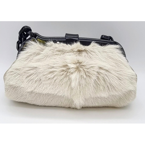 190 - A CHANEL 5 faux fur clutch bag with original cloth protective bag. Serial No: 10258973, Ref: 9378