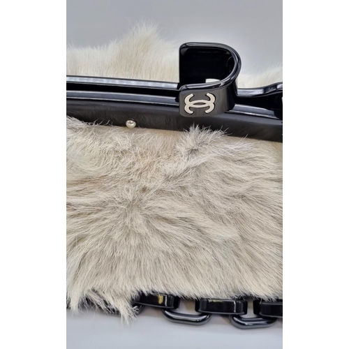 190 - A CHANEL 5 faux fur clutch bag with original cloth protective bag. Serial No: 10258973, Ref: 9378