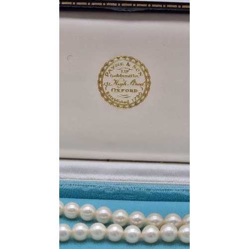 225 - A Beautiful Natural South Sea Graduated Pearl Necklace with an 18K Yellow Gold Clasp. 44cm. 31.15g t... 