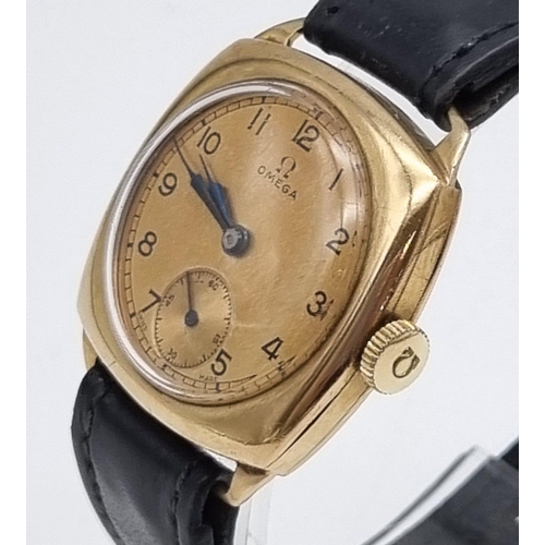 79 - A Beautiful 1930s Omega 9K Gold Cushion Watch. Black leather strap with a 9K gold case - 30mm. Gold ... 