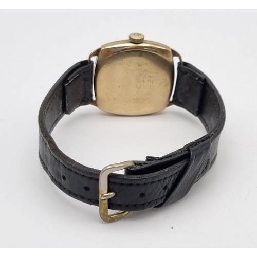 79 - A Beautiful 1930s Omega 9K Gold Cushion Watch. Black leather strap with a 9K gold case - 30mm. Gold ... 