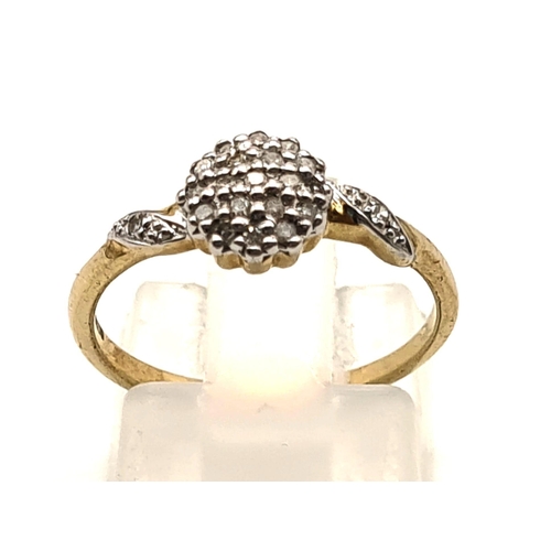 290 - 9K YELLOW GOLD DIAMOND TWIST CLUSTER RING 1.5G SIZE L