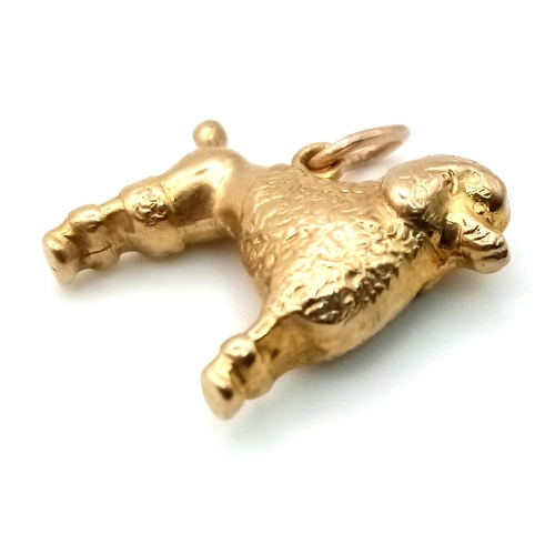 615 - A Vintage 9K Yellow Gold Poodle Pendant. 18mm. 1.21g