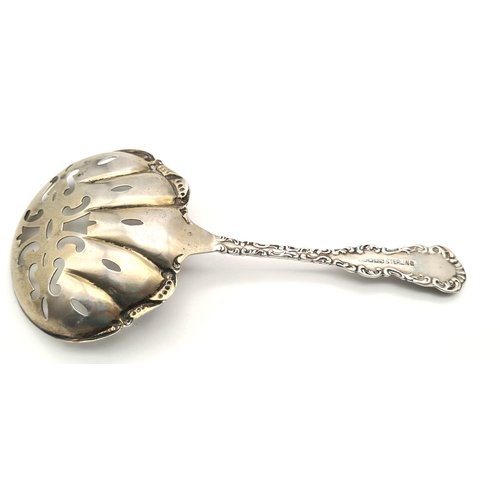 694 - Sterling silver 925 sugar sieve, 13cm in length, 16 grams in total