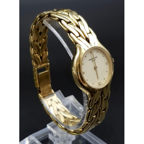 94 - An 18 K yellow gold PATEK PHILIPPE ladies watch. 23 mm dial, cream coloured face with four diamonds ... 