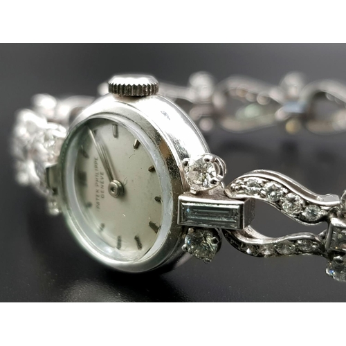 178 - An 18 K white gold PATEK PHILIPPE ladies diamond watch. 18 mm dial, bracelet fully covered with bagu... 