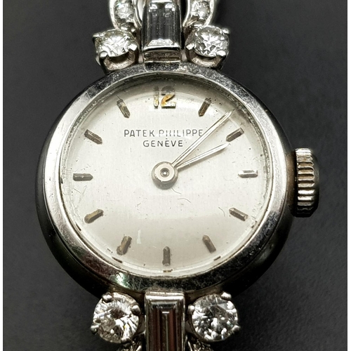 178 - An 18 K white gold PATEK PHILIPPE ladies diamond watch. 18 mm dial, bracelet fully covered with bagu... 