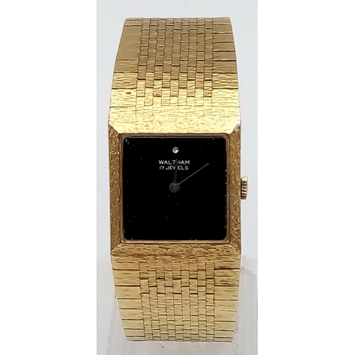 666 - A Gold Plated Waltham Dress Watch. Case - 26mm. Black dial. Quartz movement. Needs a battery so A/F.... 