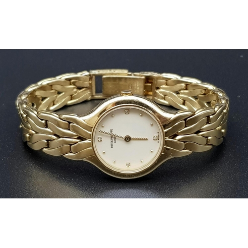 94 - An 18 K yellow gold PATEK PHILIPPE ladies watch. 23 mm dial, cream coloured face with four diamonds ... 