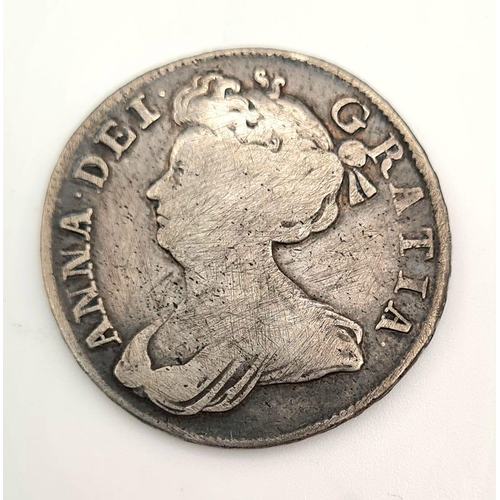 205 - A Queen Anne 1708 Half Crown Silver Coin. 14.62g. 34mm diameter. Please see photos for conditions.